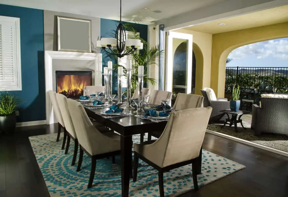 Beautiful dining area with table and rug