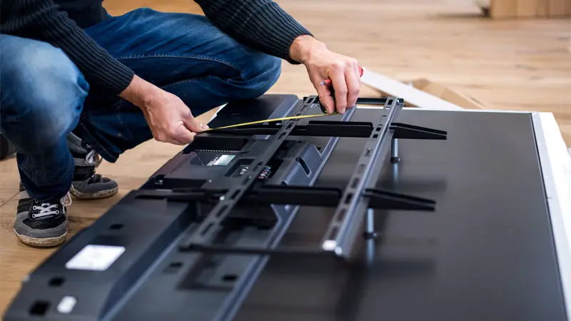 how high to mount a TV in a bedroom